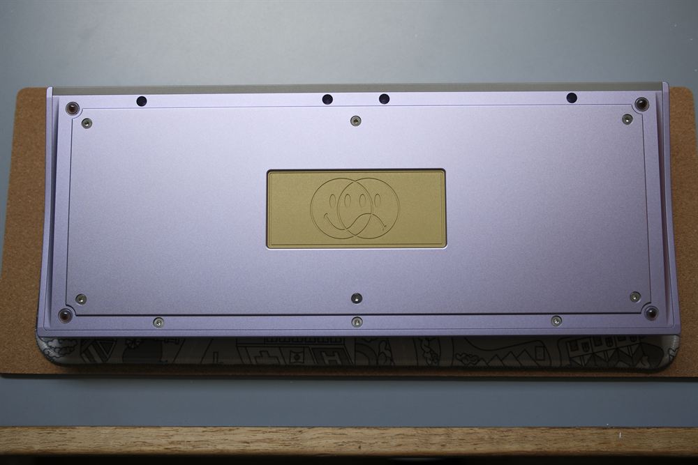 Full underside of the case with the brass weight centered