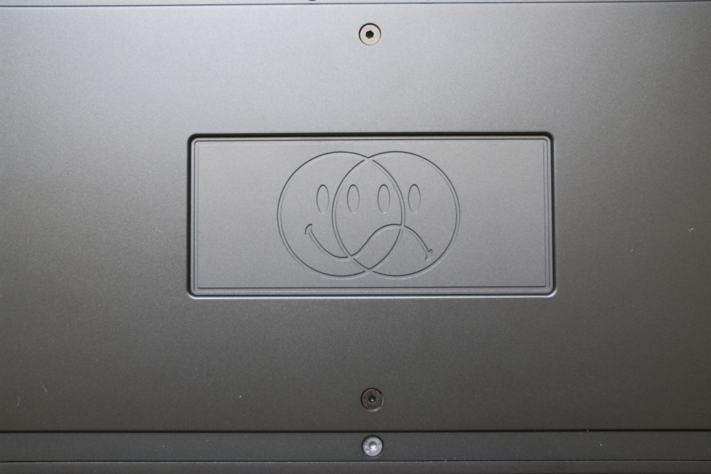 Macro of the interlocking dual-face engraving on the underside