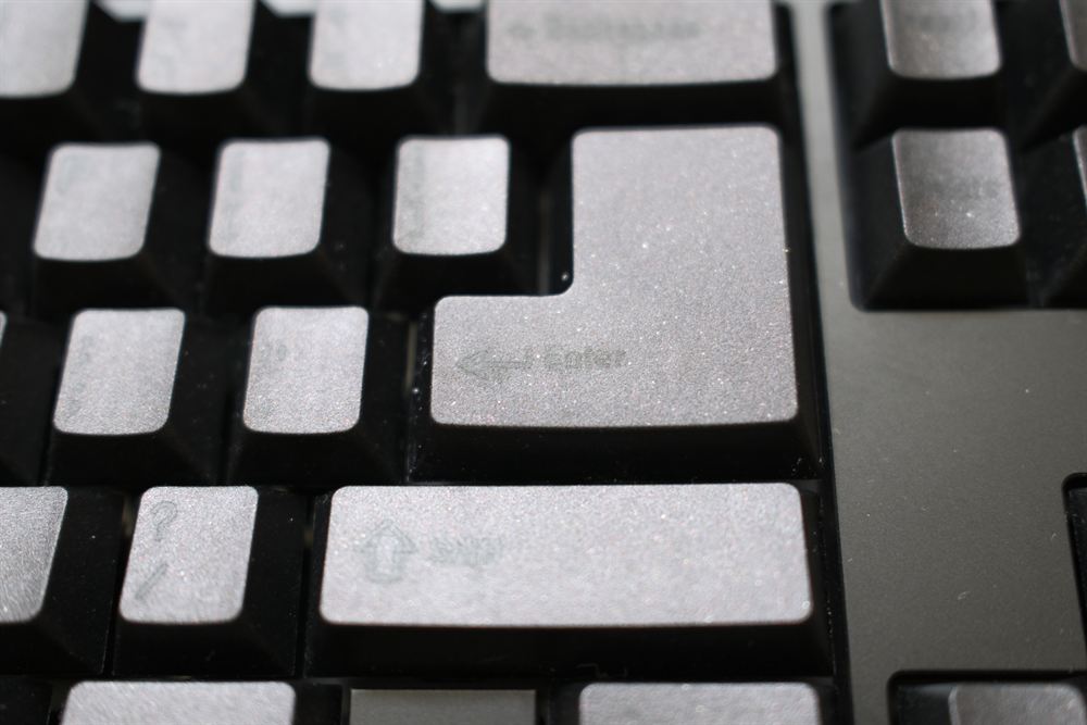 Angled macro of the stepped Big Ass Enter and right keys