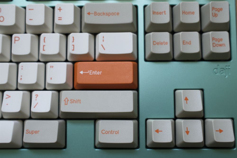 Close-up of the right side, orange Enter and nav keys
