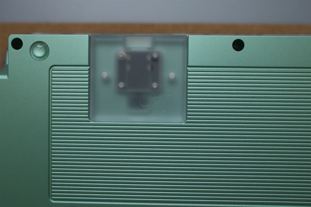 Macro of the underside weight and daji badge