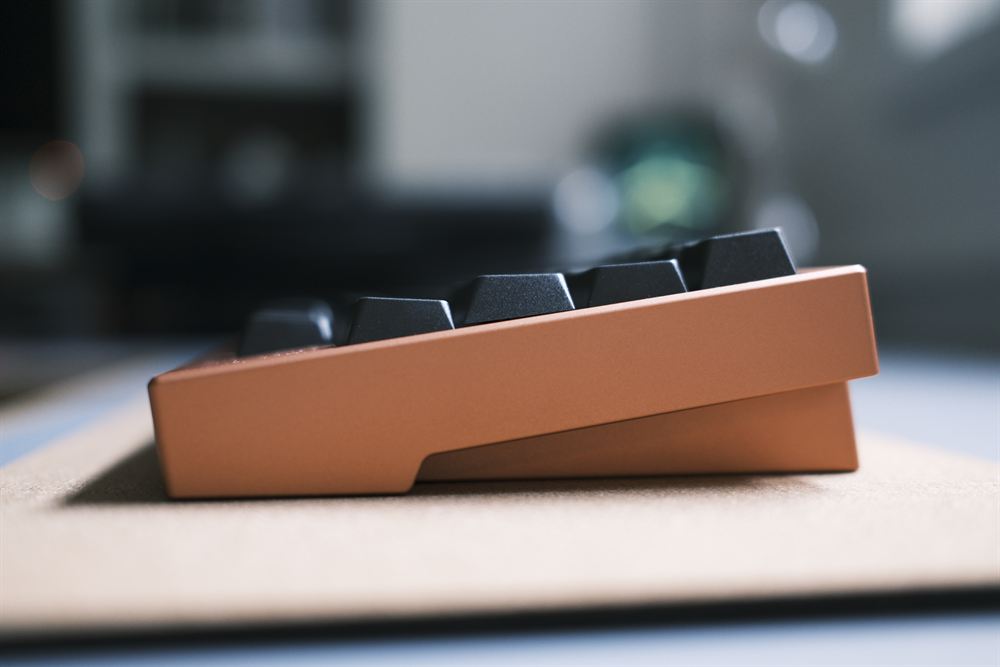 Side profile of the keyboard on a cork mat