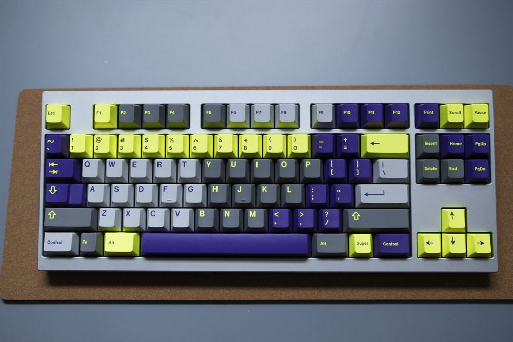 Top-down plan view showing the purple spacebar and volt accents