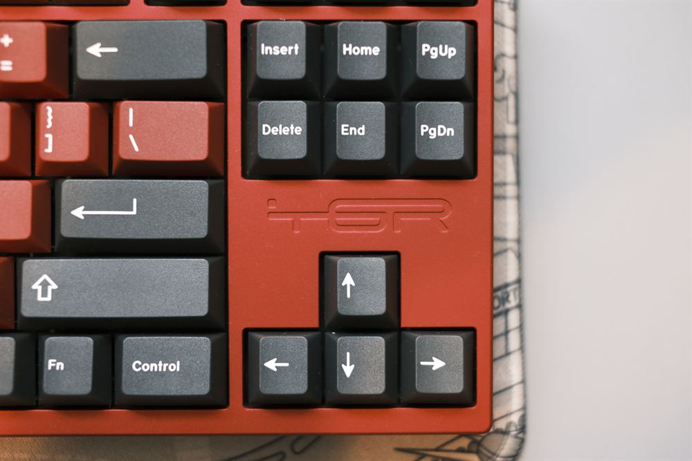 Close-up of the nav cluster, arrows and embossed TGR logo