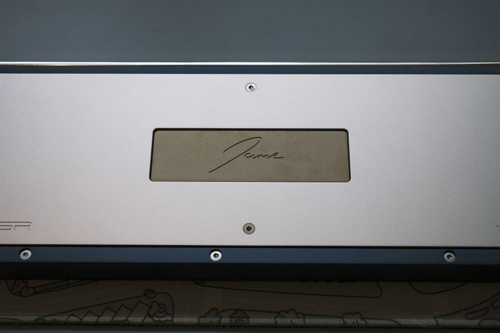Macro of the Jane signature on the weight against a dark background