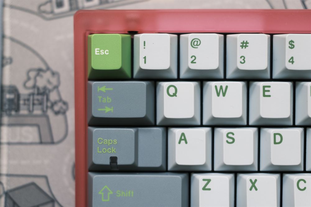 Close-up of the lime Esc key and top-left alphas