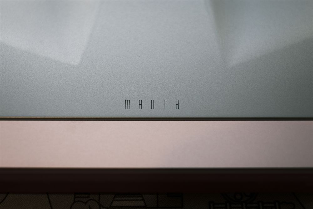 Macro of the brushed top plate with MANTA engraving