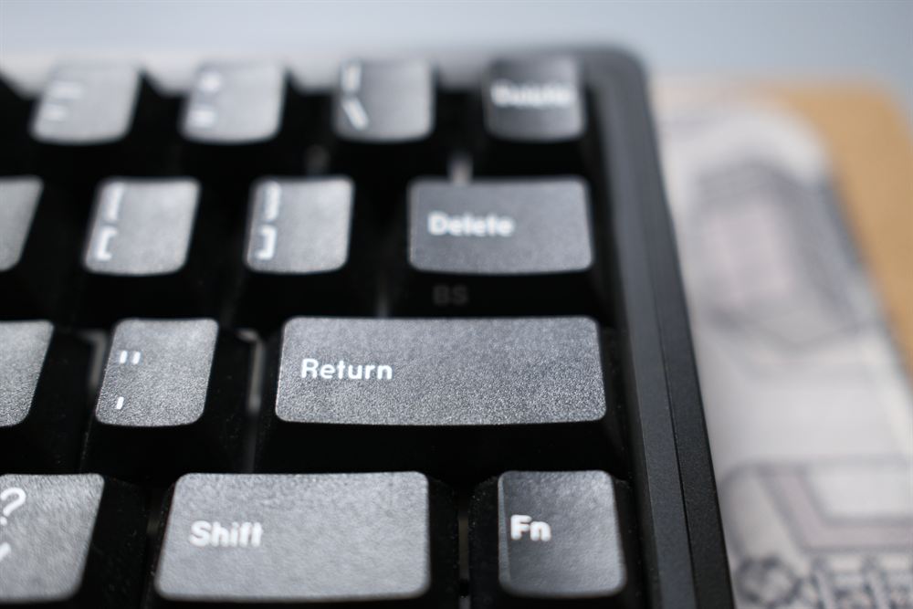 Macro of the Return and Delete keys in black GMK Mono
