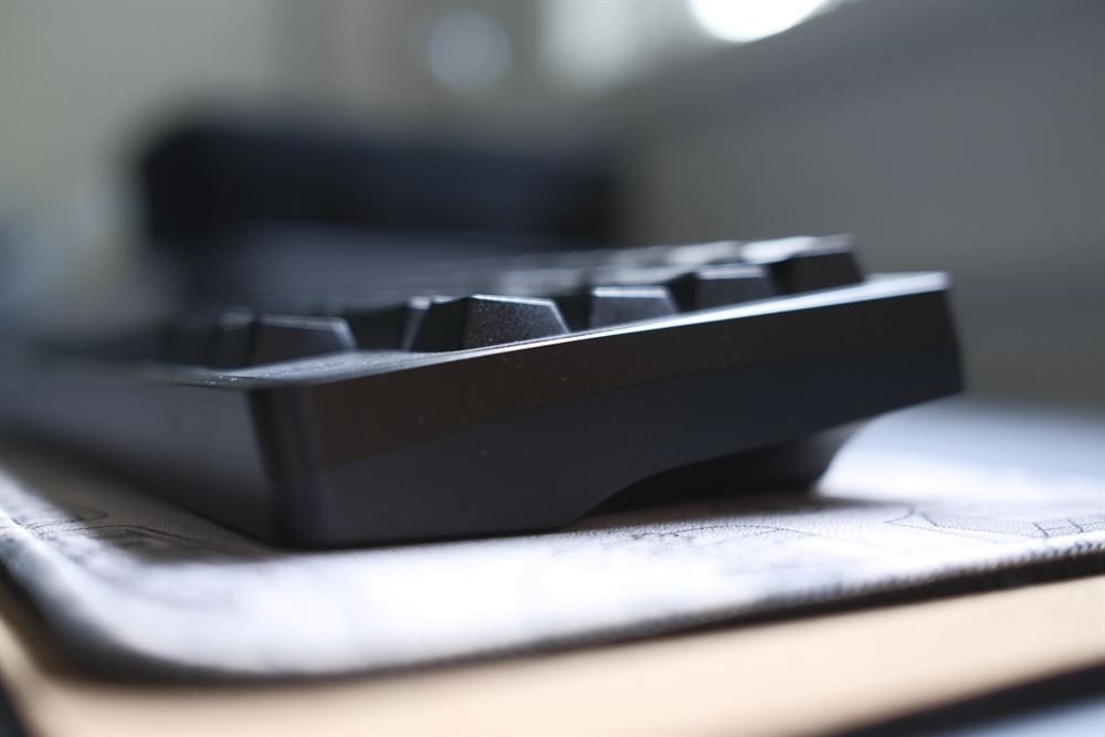 Bowl Pangea Mini — all-black HHKB with GMK Mono and a machined weight