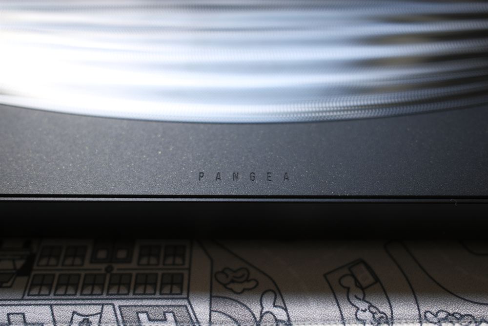 Close-up of the PANGEA engraving below the machined waves