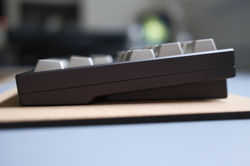 Low side profile of the black case on a cork mat