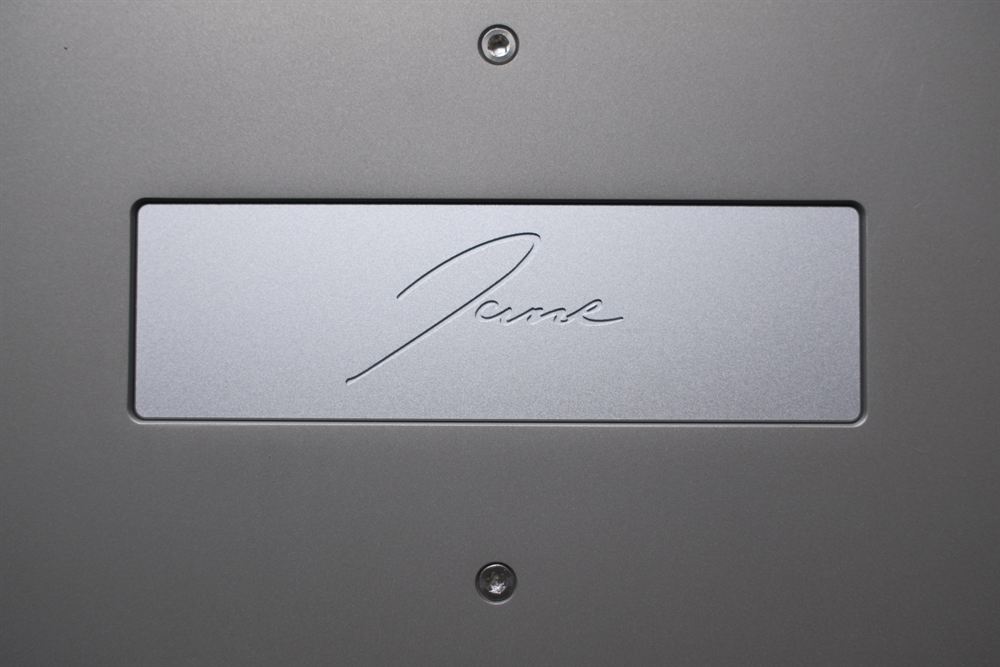 Macro of the engraved Jane signature on the back weight