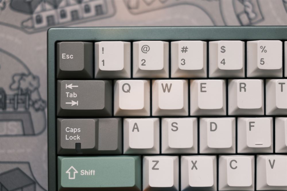 Top-down of upper-left keys: Esc, Tab, Caps, Shift