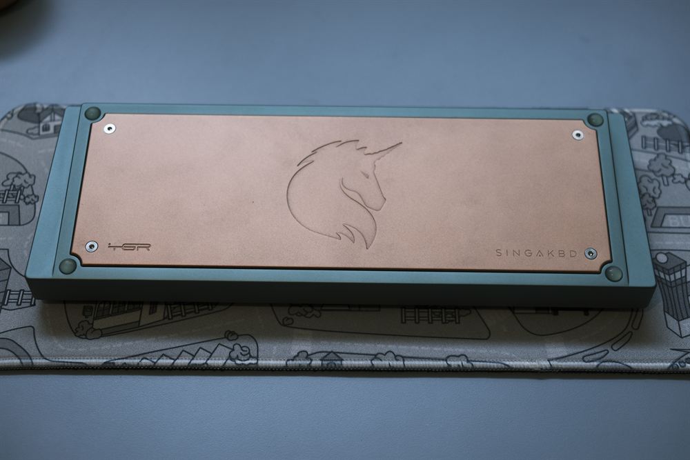 Full underside plan view with the copper weight and unicorn engraving